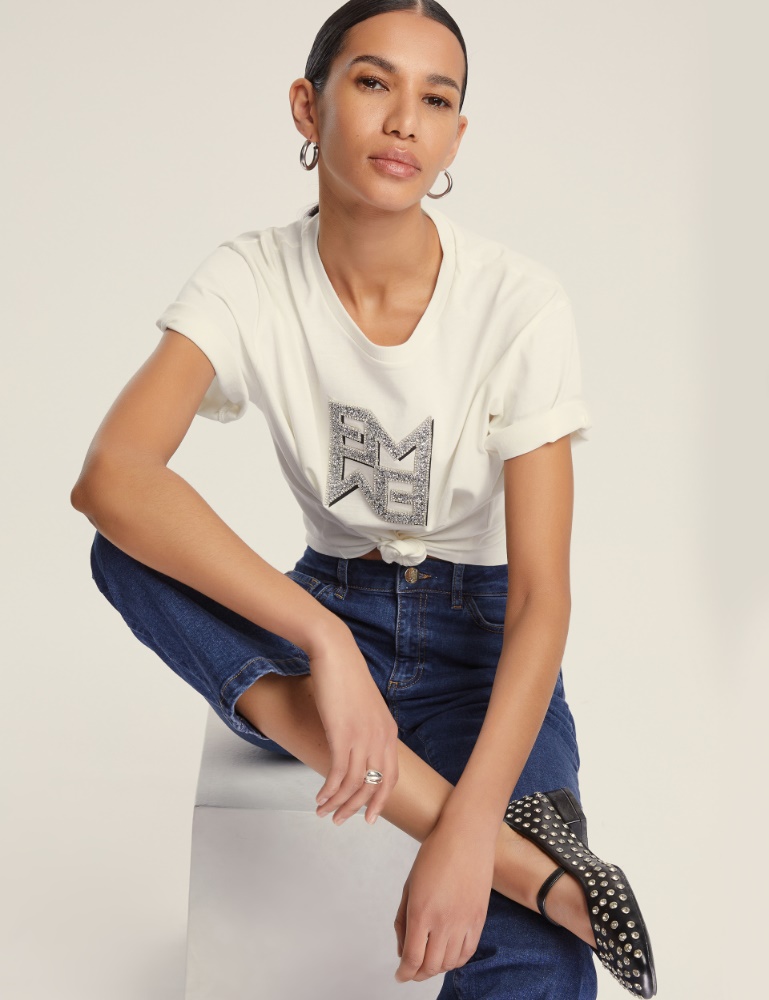 Jeans flare aderente cropped - Emme